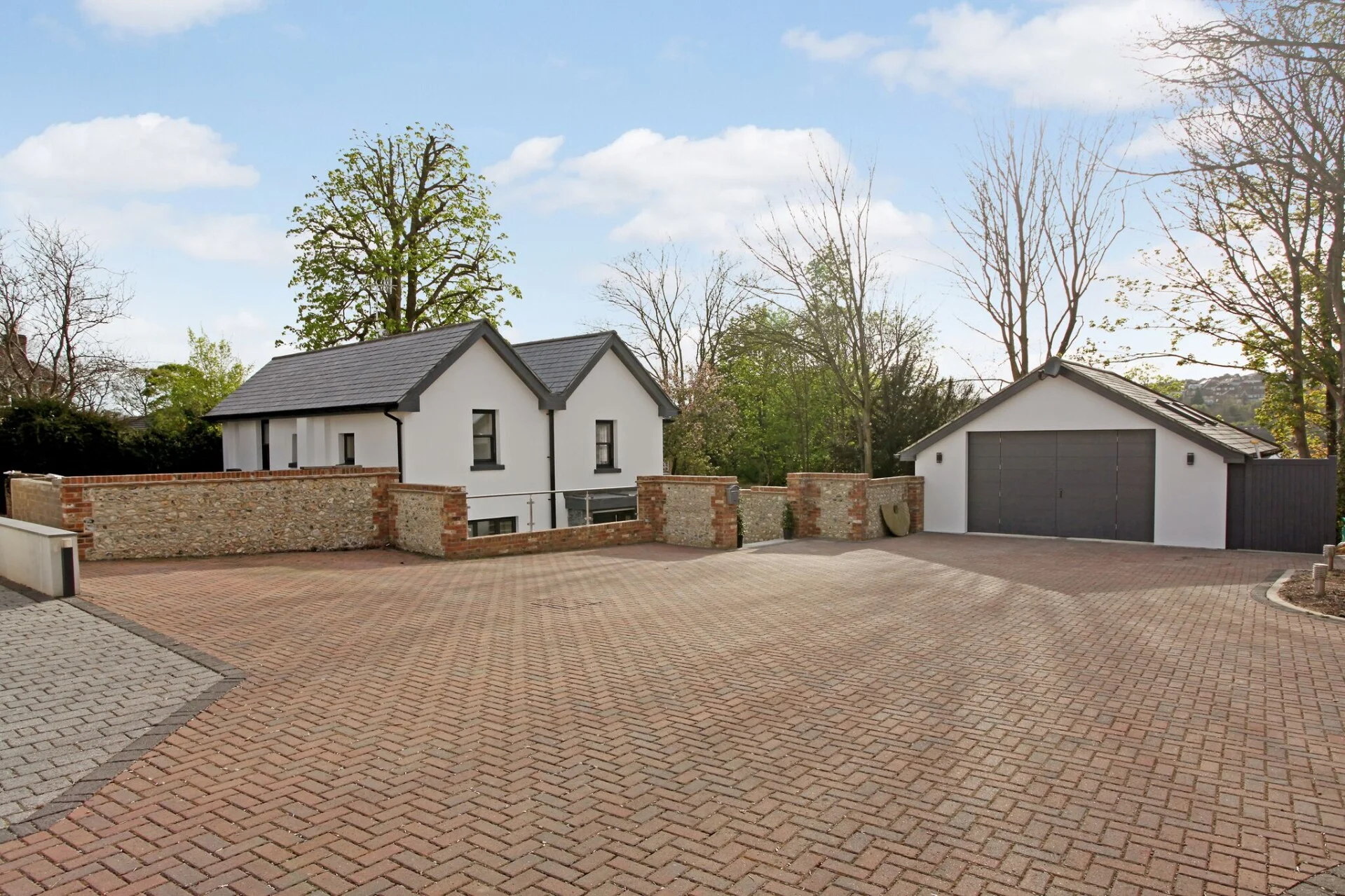 Bespoke new build property with block paving driveway and double garage in Sussex