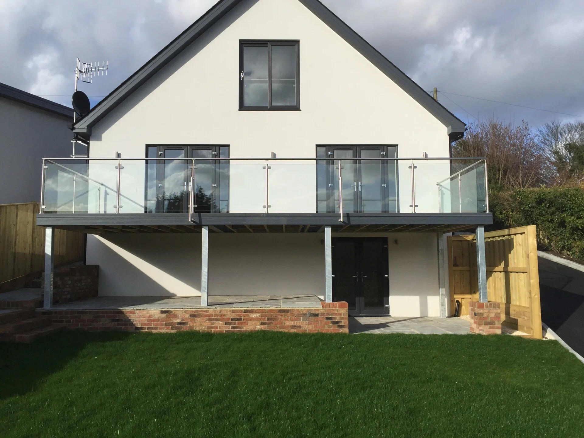Interior renovation with new kitchen and exposed brick feature wall