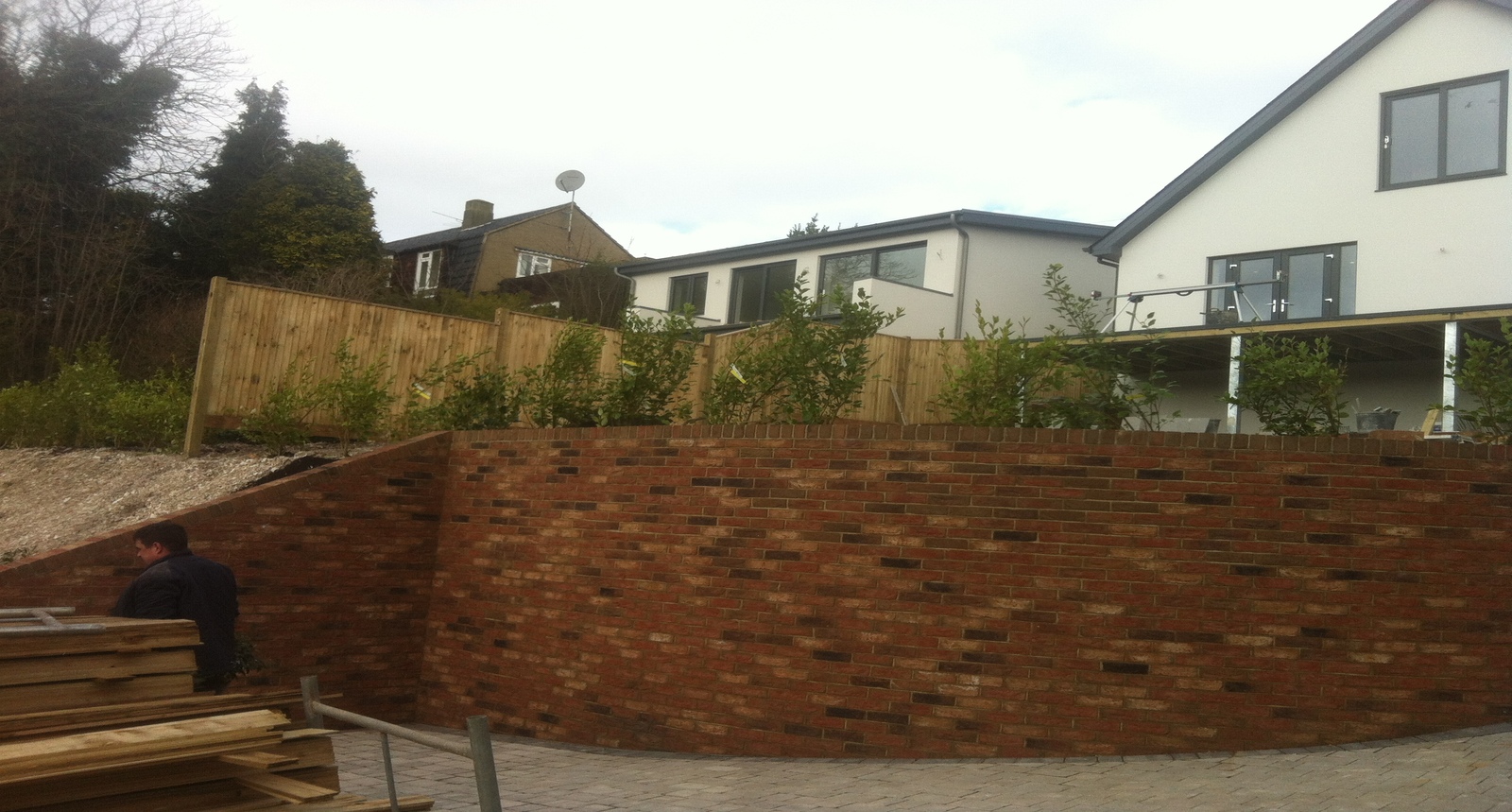 Engineered retaining wall construction for sloped garden in Brighton