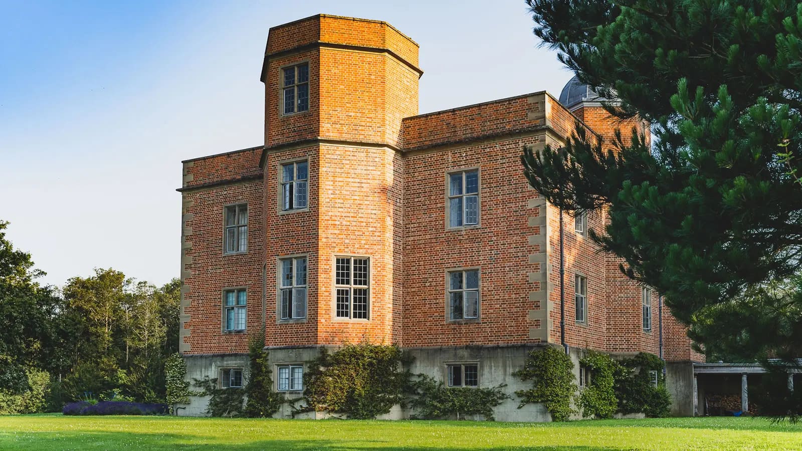 Whithurst Park mansion brick exterior with grounds in Kirdford, Sussex